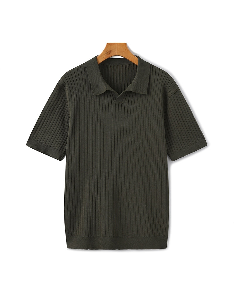 Dark green ribbed polo shirt on a hanger against a white background