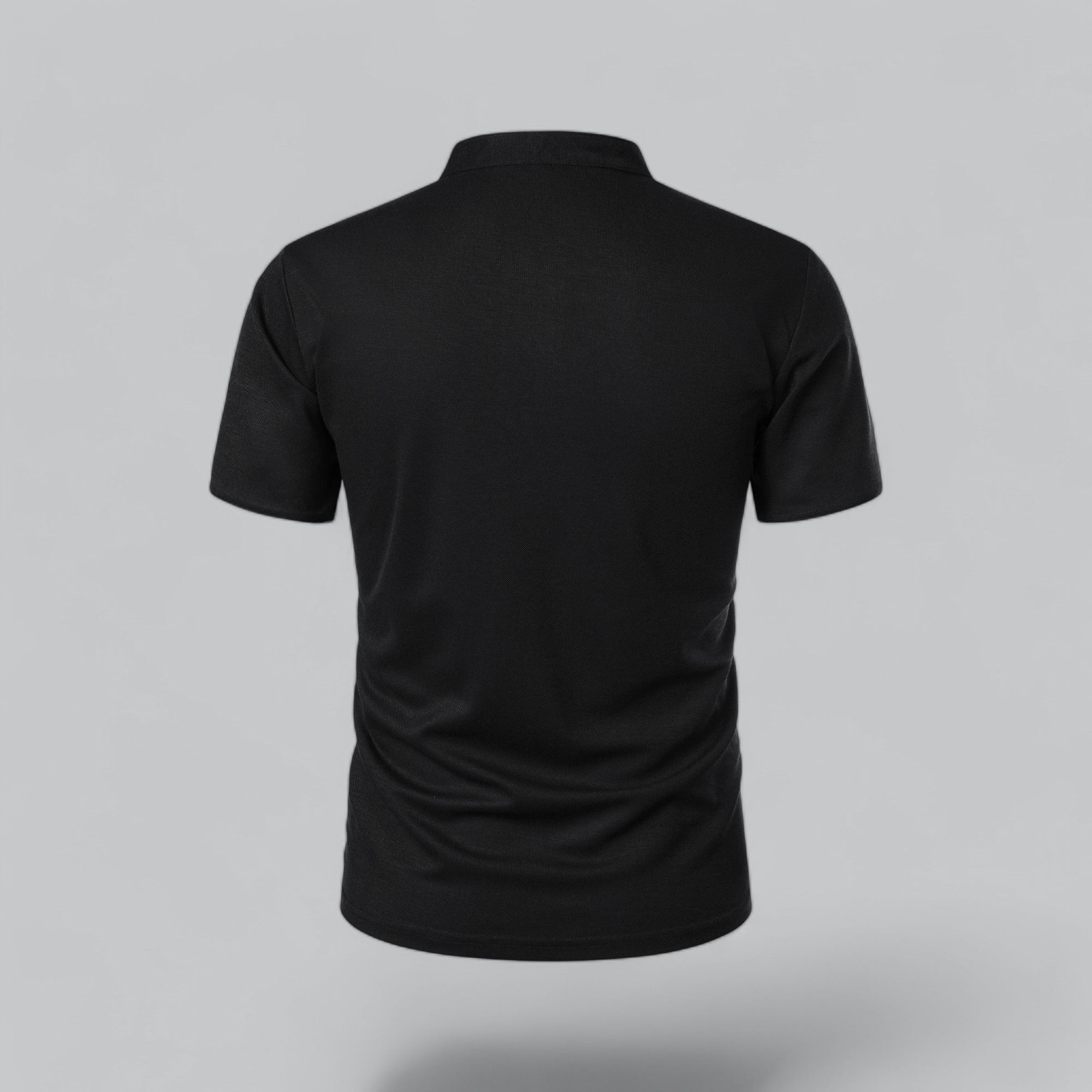 Black polo shirt on a gray background