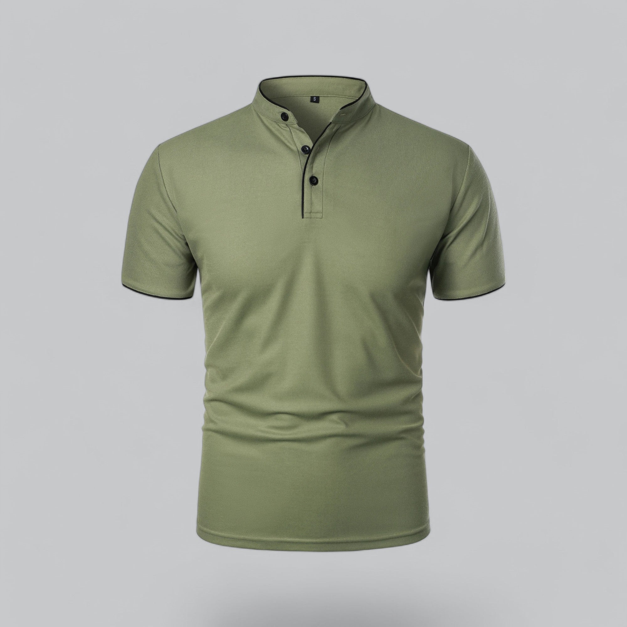 Green polo shirt on a gray background
