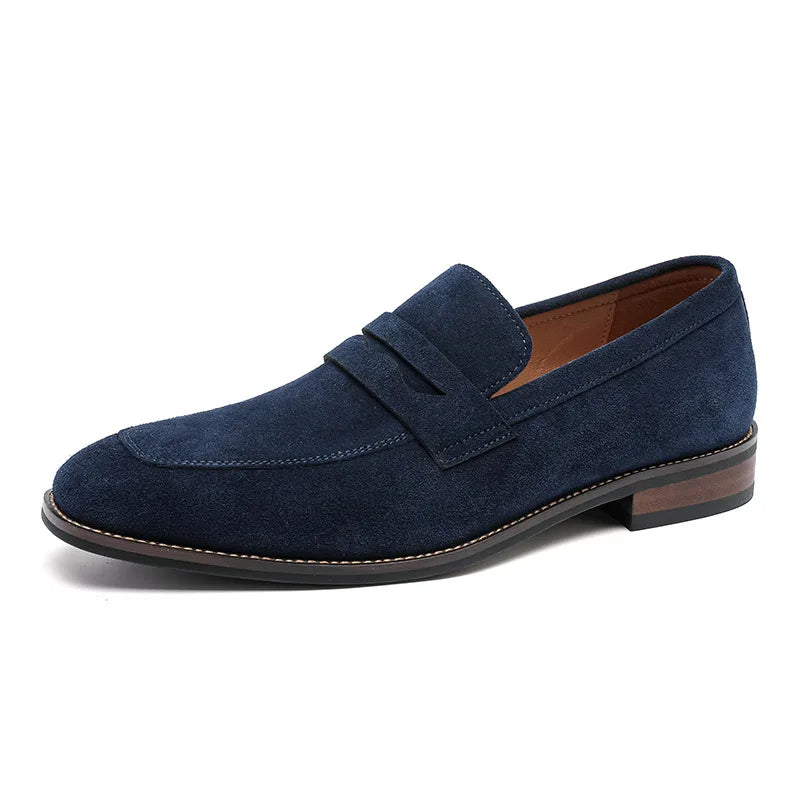 Blue suede loafer shoe on a white background