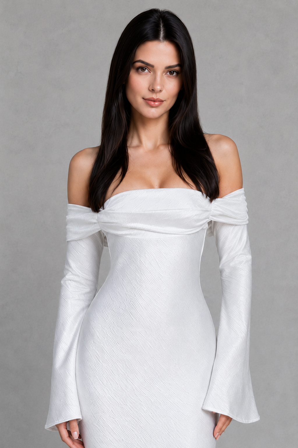 Woman wearing a white off-shoulder dress against a gray background
