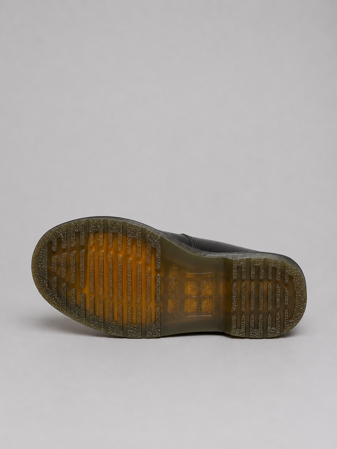 Close-up of a shoe sole on a light gray background