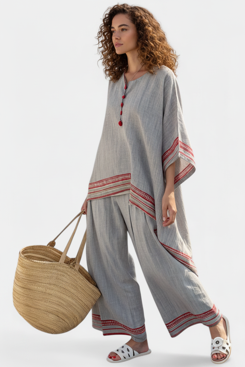 Women’s embroidered blouse with asymmetrical design and wide leg pants set