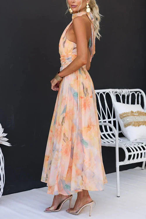 Women’s halter neck maxi dress with watercolor print and open back