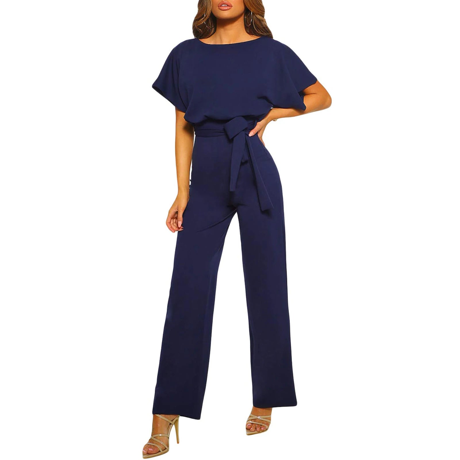 Navy blue jumpsuit worn by a model on a white background