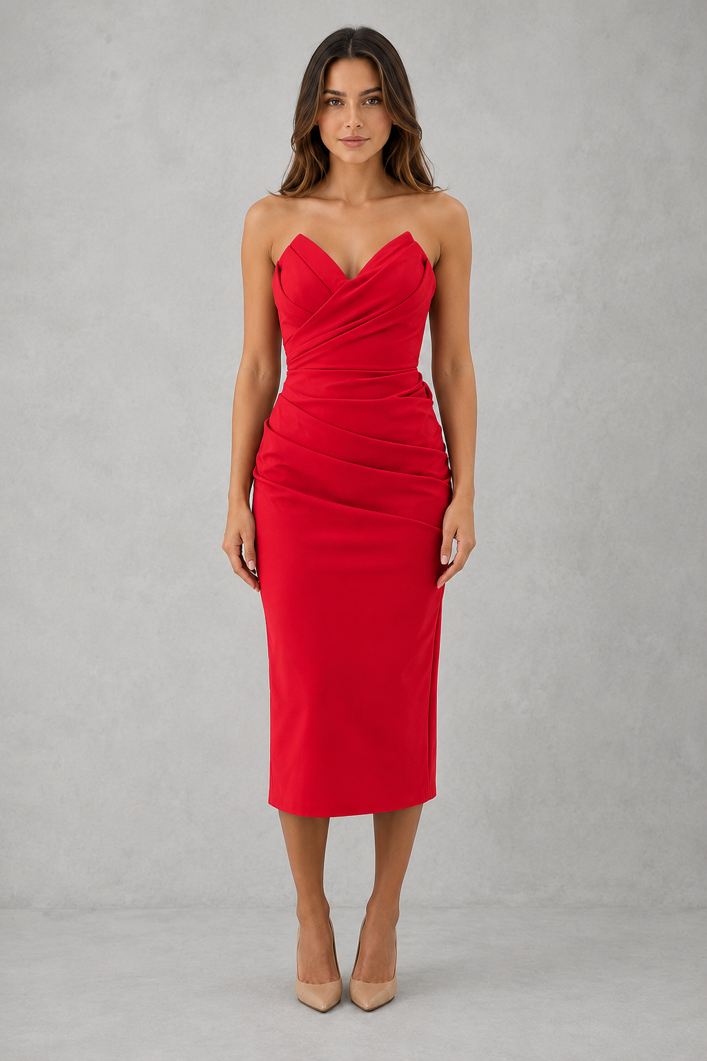 Woman wearing a red strapless dress against a gray background