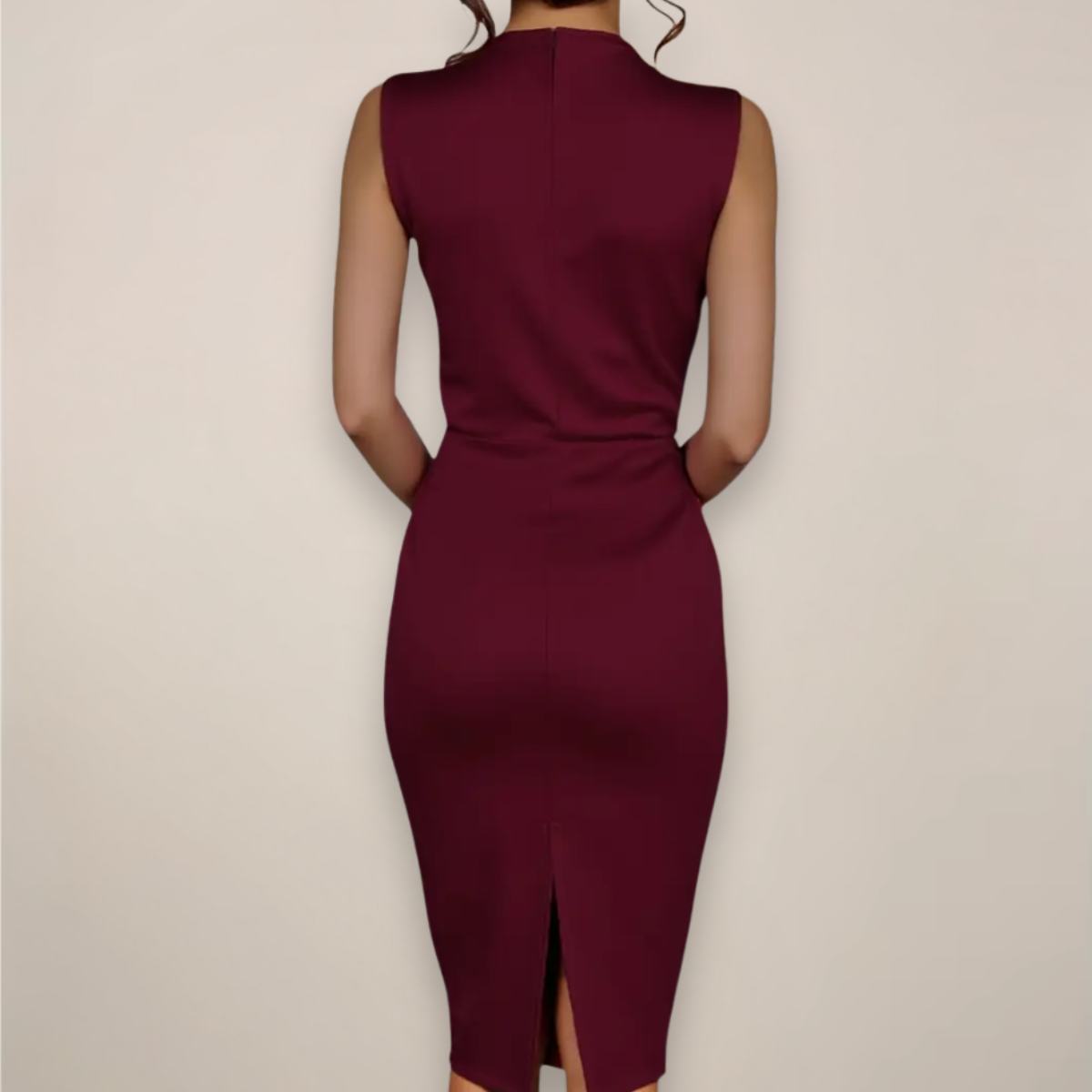 Maroon dress with a high slit on a beige background