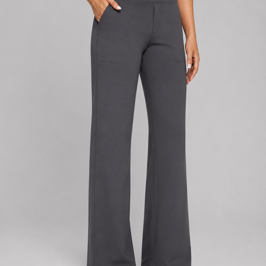 Dark gray wide-leg pants worn by a person on a gray background