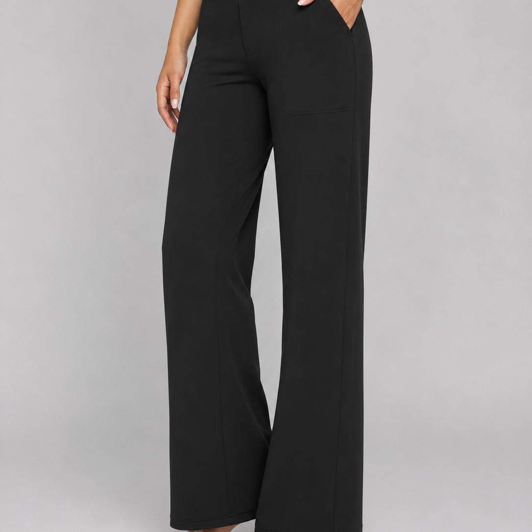 Black wide-leg pants worn by a person on a gray background