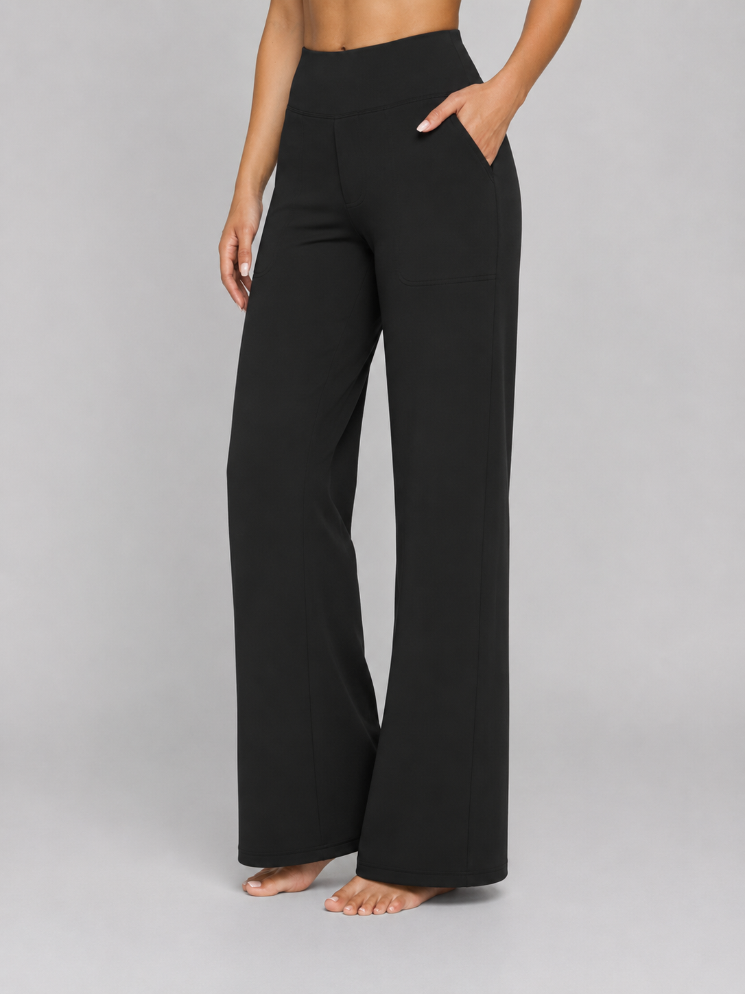 Black wide-leg pants worn by a person on a gray background