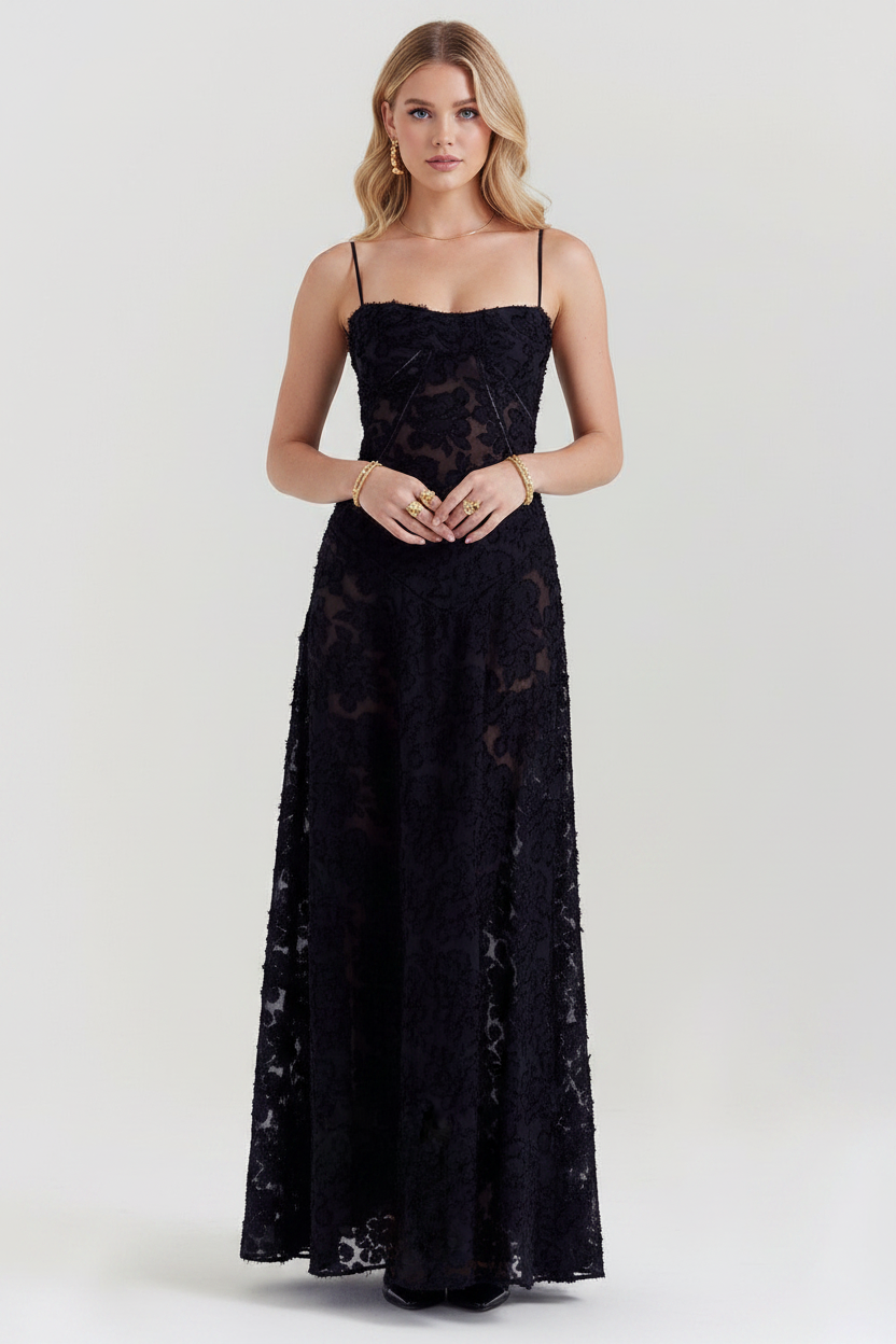 Woman wearing a black lace dress on a white background