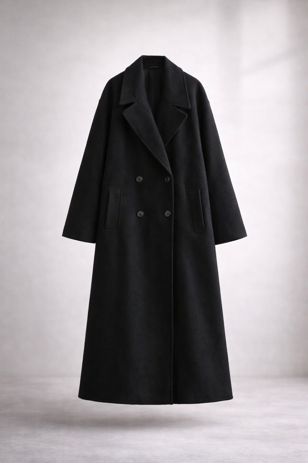 Black coat on a light gray background
