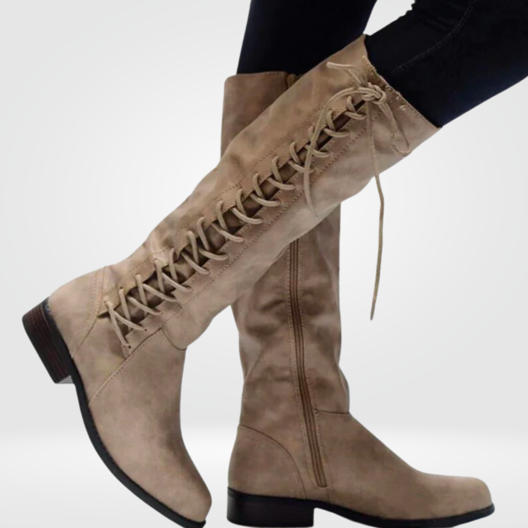 Women’s beige leather high boots with cosy lining and non-slip sole, elegant and versatile for everyday wear.