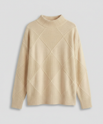 Women’s soft turtleneck sweater in beige, warm and comfortable, stylish for casual and elegant winter outfits.