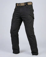 Men’s outdoor pants in black with weather-resistant fabric, ergonomic design, and elastic cuffs for trekking, hiking, and climbing.