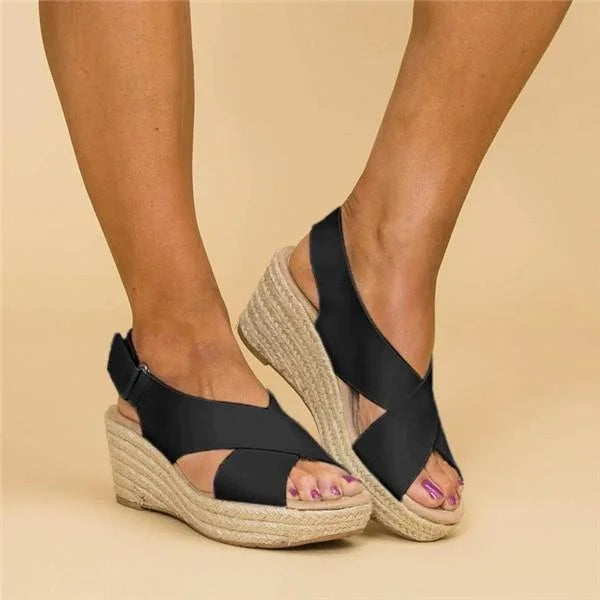 Women’s orthopaedic wedge espadrilles in black with cushioned footbed, stylish and supportive for everyday wear.