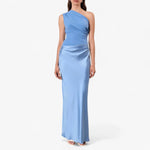 Women’s asymmetric maxi dress in blue with delicate pleats, flowing and elegant for weddings and formal events.1