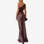 Women’s asymmetric maxi dress in brown with delicate pleats, flowing and elegant for weddings and formal events.1