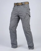 Men’s outdoor pants in gray with weather-resistant fabric, ergonomic design, and elastic cuffs for trekking, hiking, and climbing.