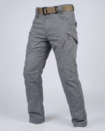 Men’s outdoor pants in gray with weather-resistant fabric, ergonomic design, and elastic cuffs for trekking, hiking, and climbing.