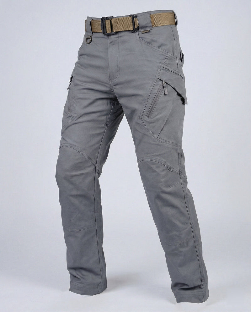 Men’s outdoor pants in gray with weather-resistant fabric, ergonomic design, and elastic cuffs for trekking, hiking, and climbing.
