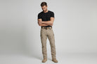 Men’s outdoor pants in khaki with weather-resistant fabric, ergonomic design, and elastic cuffs for trekking, hiking, and climbing.