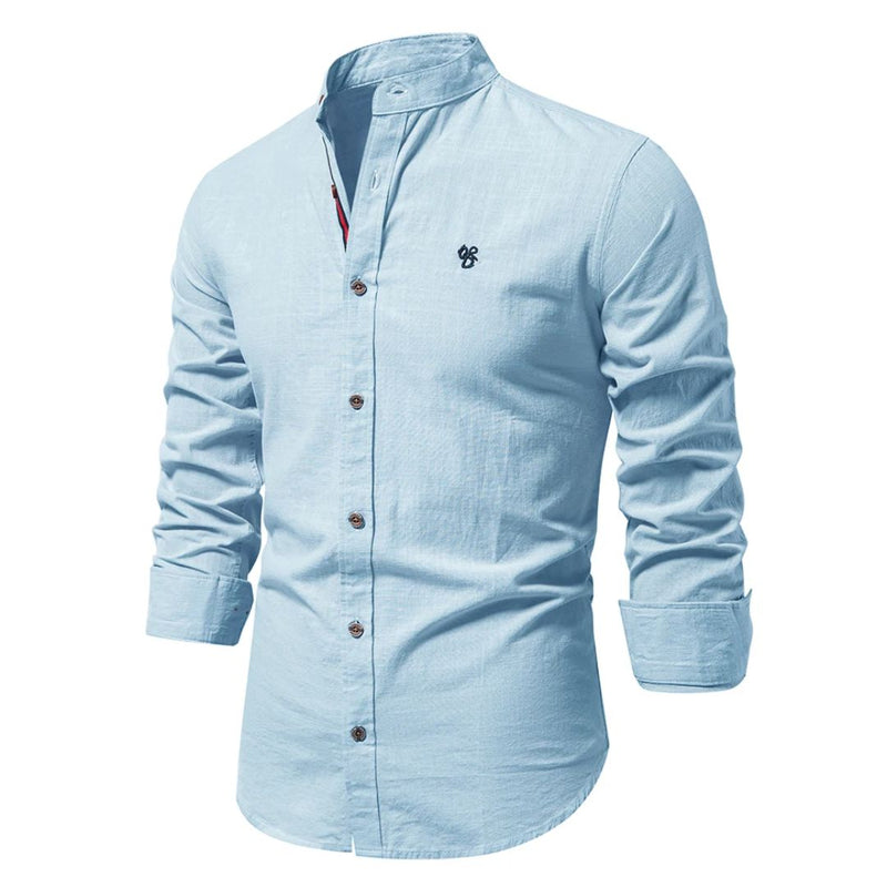 Men’s traditional shirt in light blue with classic button design, comfortable and stylish for smart casual and business wear.