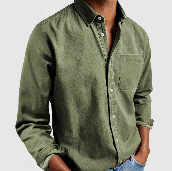 Green button-up shirt worn by a person on a light gray background