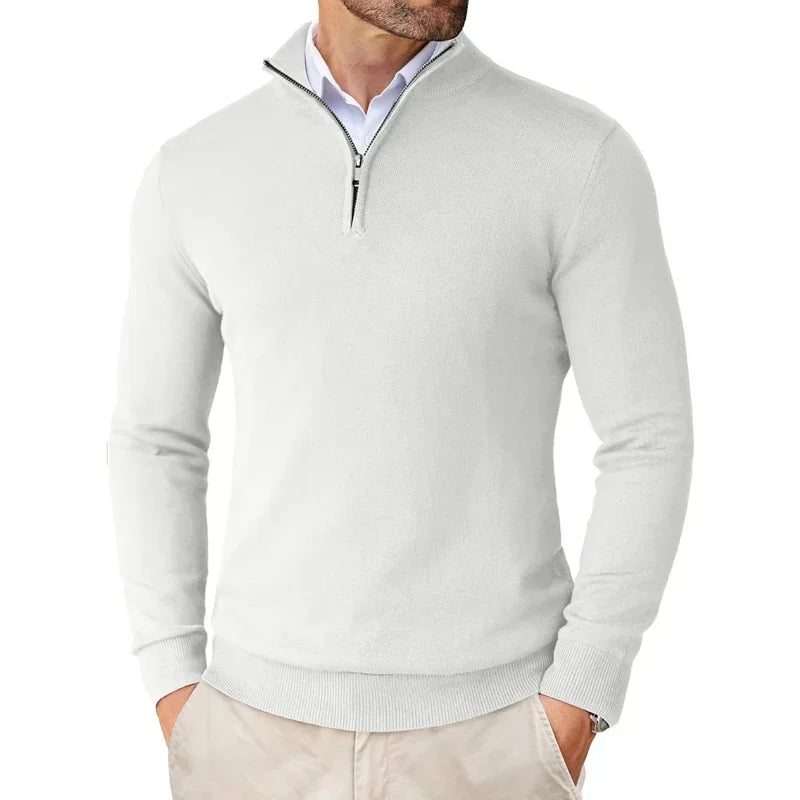 Light gray quarter-zip sweater worn by a person on a white background