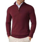 Maroon quarter-zip sweater worn by a person on a white background