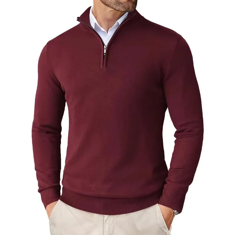 Maroon quarter-zip sweater worn by a person on a white background