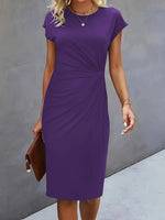 Women’s violet blue midi dress with flattering silhouette and flowing comfortable design.