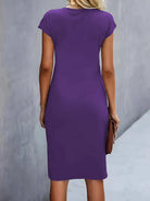 Women’s violet blue midi dress with flattering silhouette and flowing comfortable design.1