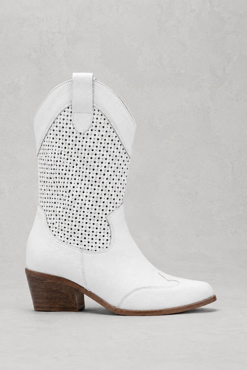 White cowboy boot with studded detail on a light gray background