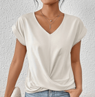 Women’s white tummy-tucking V-neck top with flattering silhouette and breathable stretch fabric.