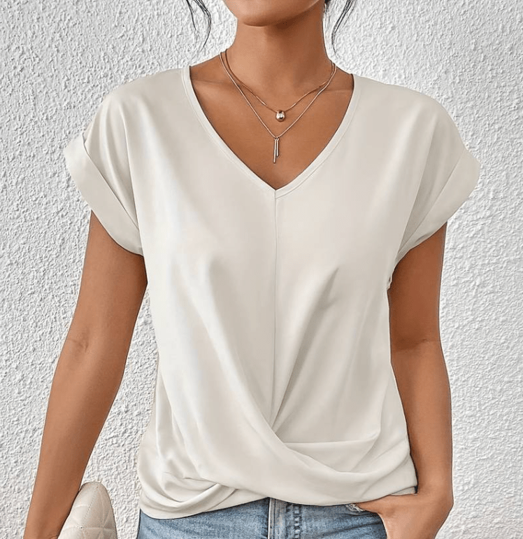 Women’s white tummy-tucking V-neck top with flattering silhouette and breathable stretch fabric.