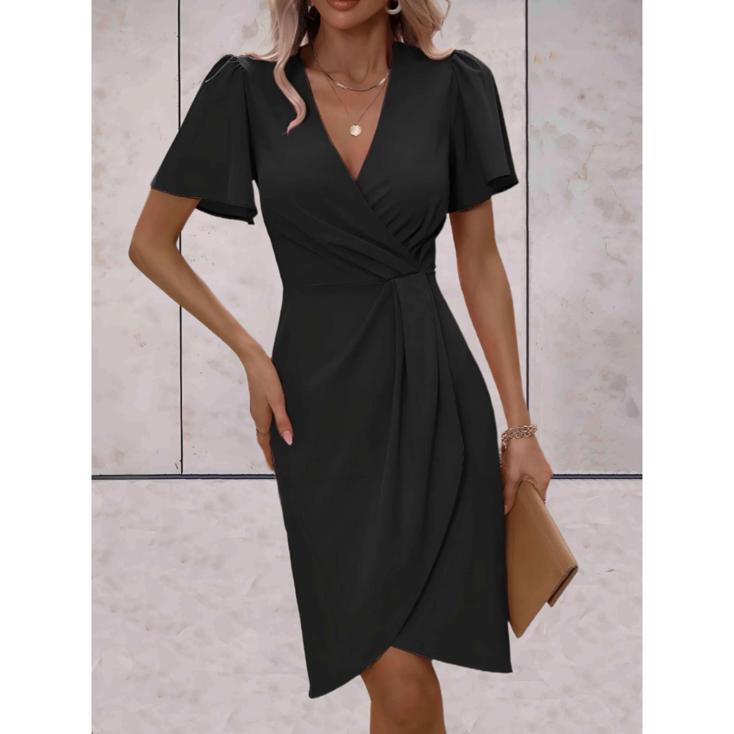 Women’s wrap dress in black with V-neck and flowing sleeves, stylish and comfortable for dinners, parties, and formal occasions.