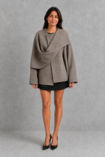 Women’s Lucille longline cape coat with an elegant relaxed silhouette and built-in scarf for cosy autumn and winter layering.