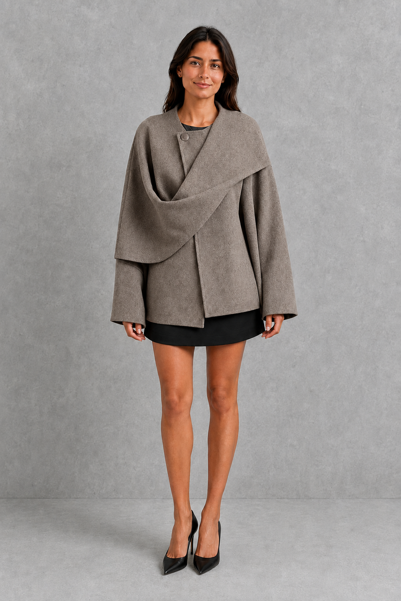 Women’s Lucille longline cape coat with an elegant relaxed silhouette and built-in scarf for cosy autumn and winter layering.