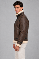 Men’s faux leather aviator jacket with a soft sherpa collar and lining, full zip front, contrast trim and relaxed silhouette.