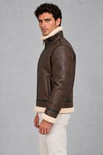 Men’s faux leather aviator jacket with a soft sherpa collar and lining, full zip front, contrast trim and relaxed silhouette.