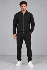 Men’s textured two-piece tracksuit with a full-zip collared jacket, ribbed trims and matching tapered drawstring joggers.