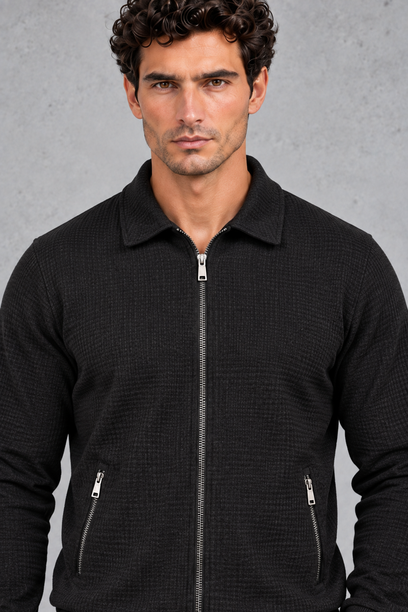 Men’s textured two-piece tracksuit with a full-zip collared jacket, ribbed trims and matching tapered drawstring joggers.