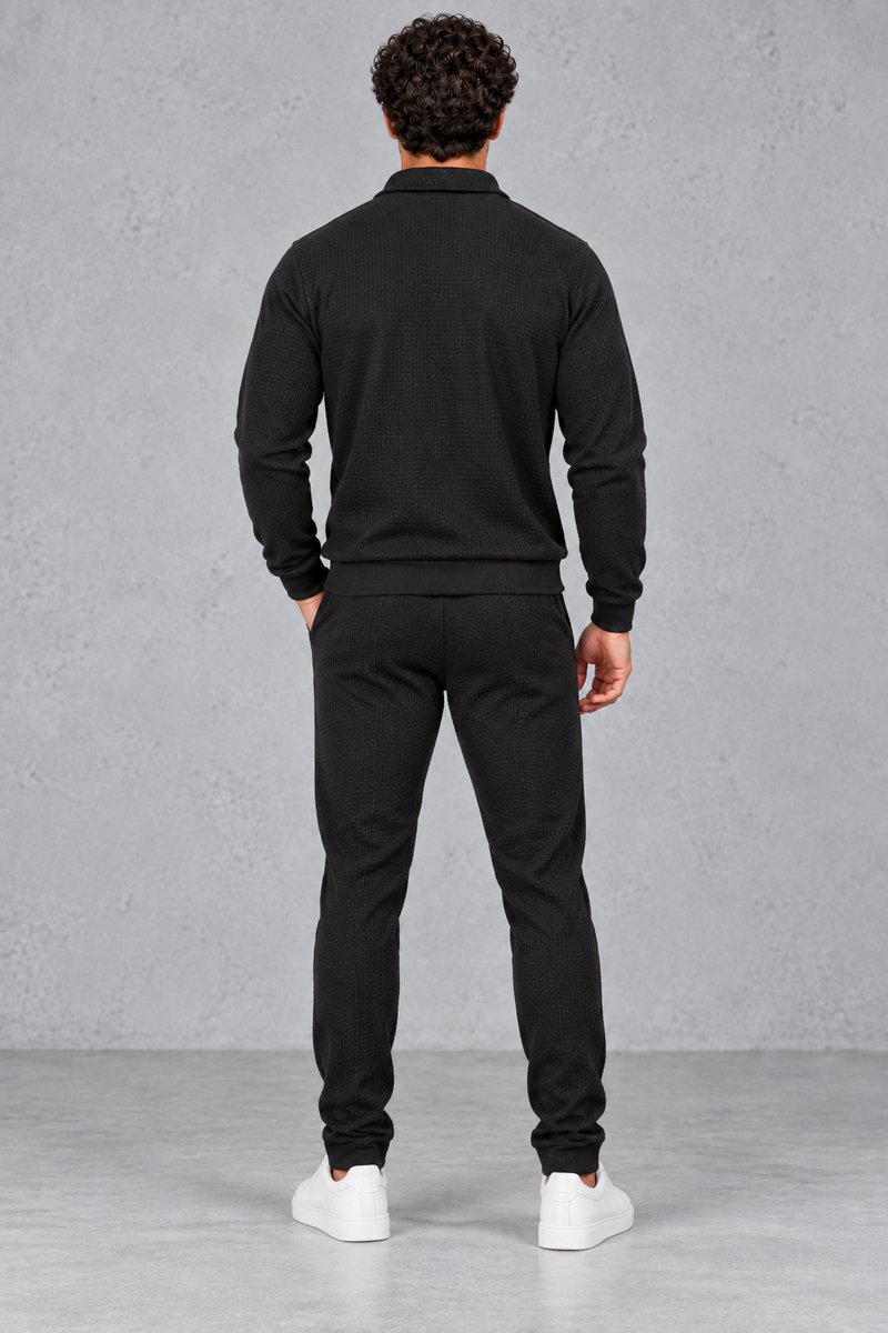 Men’s textured two-piece tracksuit with a full-zip collared jacket, ribbed trims and matching tapered drawstring joggers.
