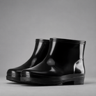 Men's tall waterproof Wellington boots with durable rubber construction, non-slip sole and pull-on design, suitable for construction work, farming, gardening, fishing and wet outdoor conditions.