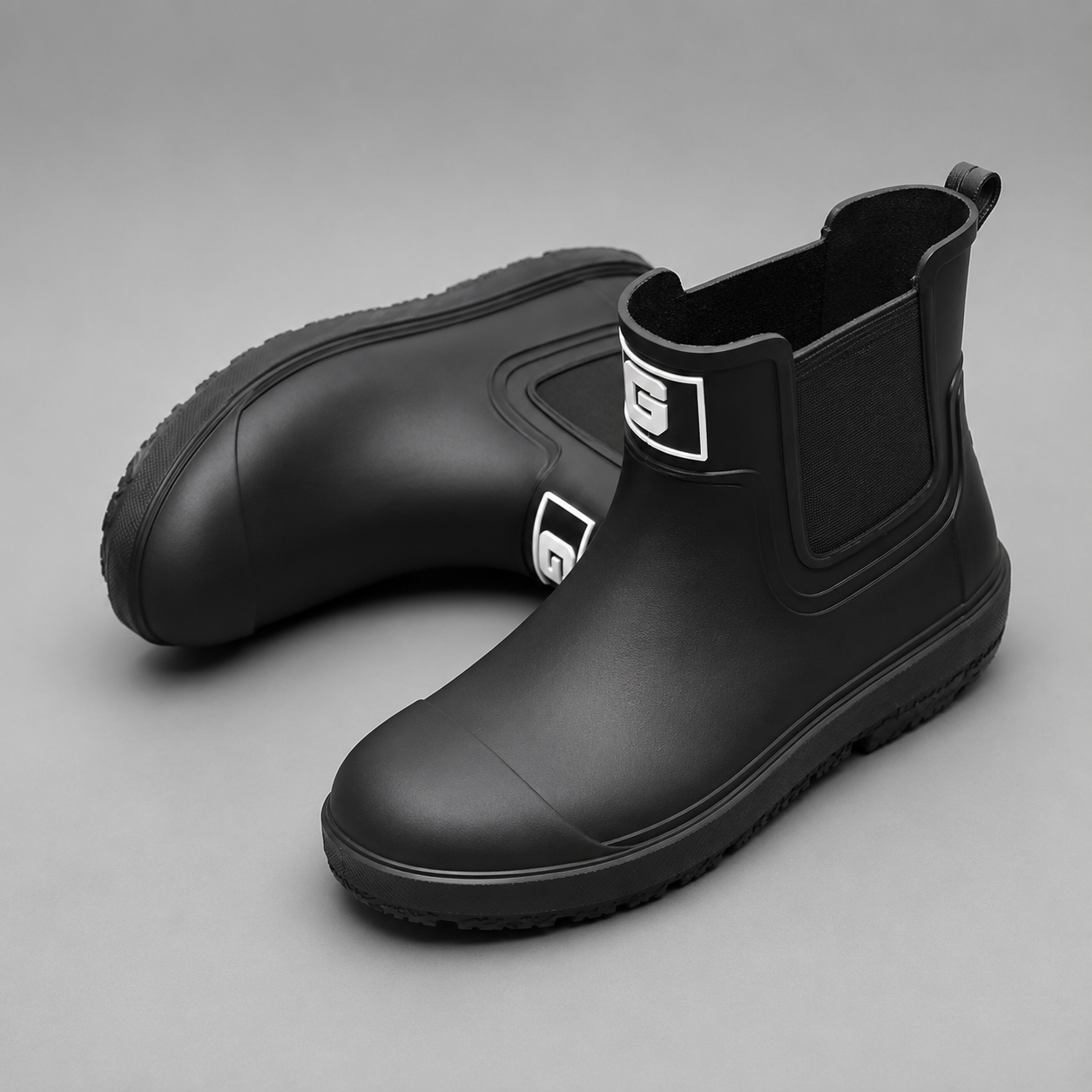 Women's waterproof ankle boots with a non-slip sole and easy pull-on design for comfortable everyday wear in wet weather.