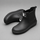 Women's waterproof ankle boots with a non-slip sole and easy pull-on design for comfortable everyday wear in wet weather.