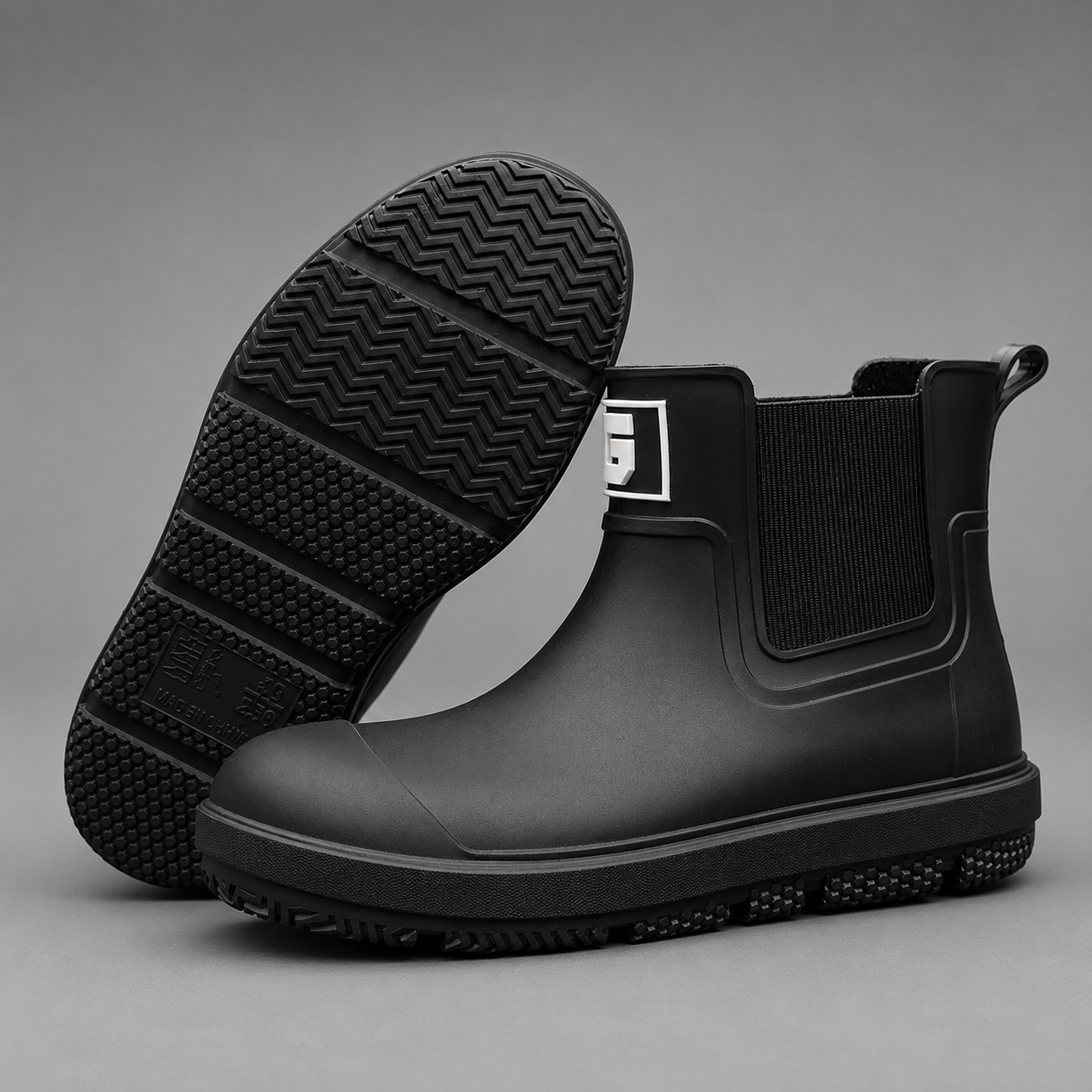 Women's waterproof ankle boots with a non-slip sole and easy pull-on design for comfortable everyday wear in wet weather.