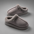 Women's fluffy winter slippers with a plush faux suede upper, soft fleece lining, thick non-slip EVA sole and slip-on design, providing warm, lightweight comfort for indoor wear during autumn and winter.
