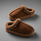 Women's fluffy winter slippers with a plush faux suede upper, soft fleece lining, thick non-slip EVA sole and slip-on design, providing warm, lightweight comfort for indoor wear during autumn and winter.